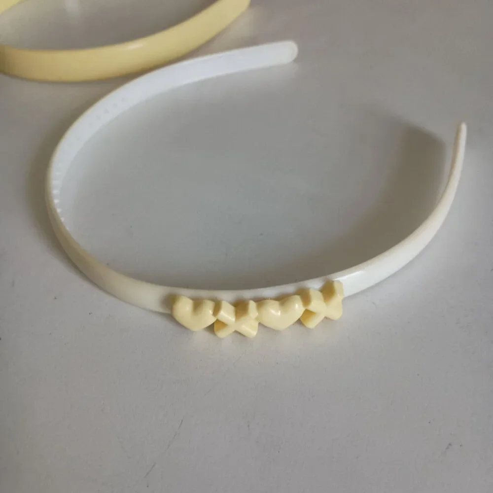 2 vintage 80's plastic headbands girls, yellow, white
